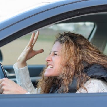 woman angry drive car