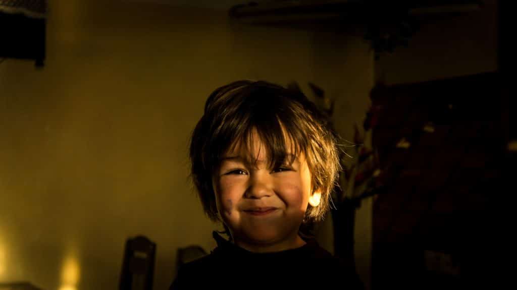 little boy smiling sun