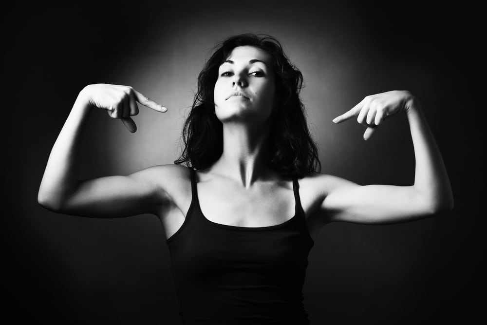 woman pointing herself black and white