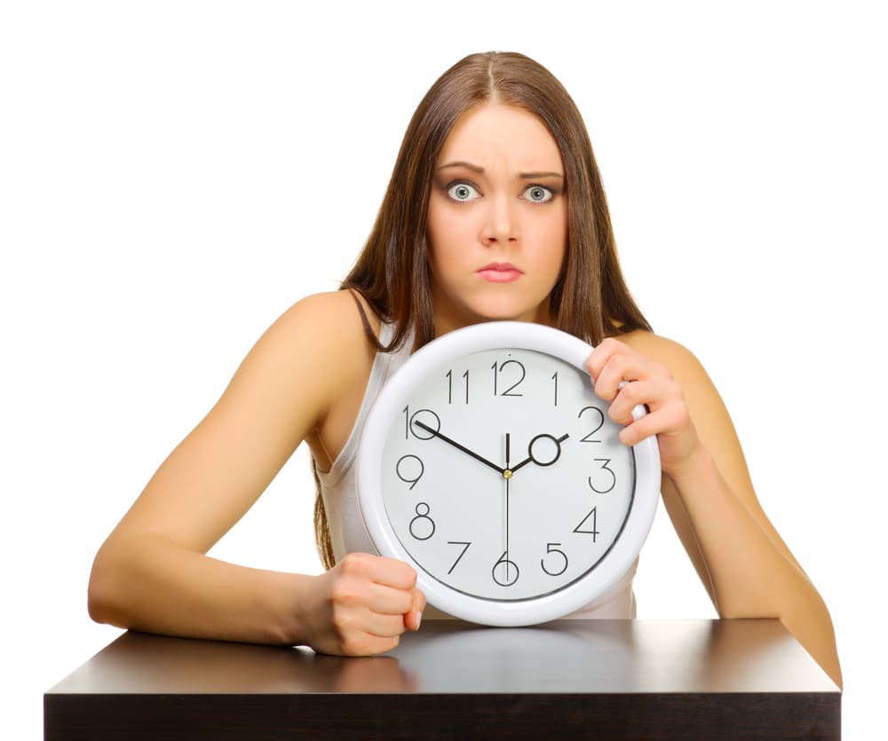 woman with clock angry