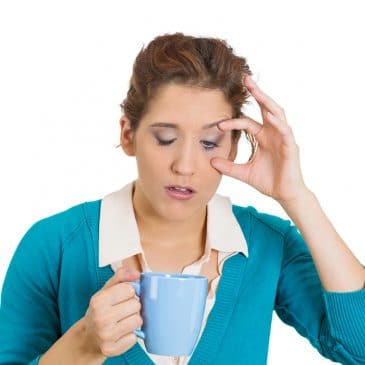 woman tired with coffee