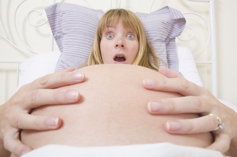 pregnant woman surprised