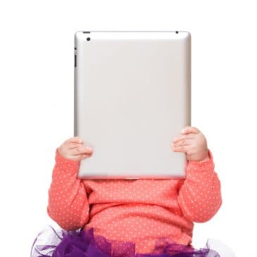 baby with tablet