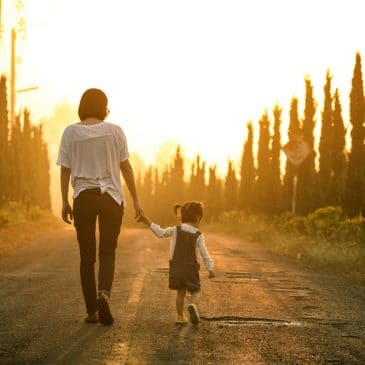 mother walking with daughter