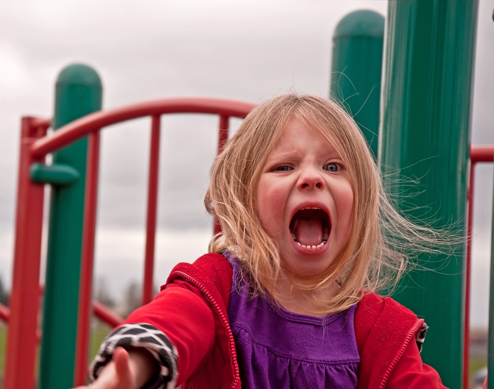 girl yelling at playground