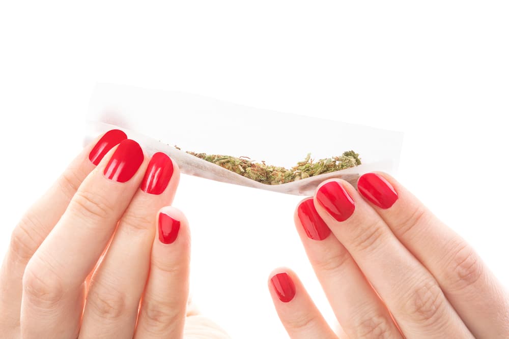 woman hands cannabis