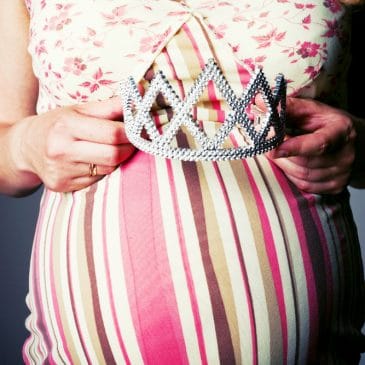 pregnant woman with crowned