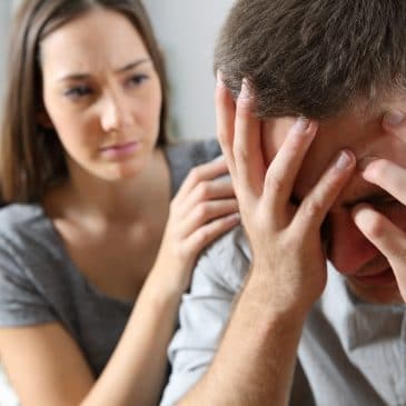 depressed man with girlfriend
