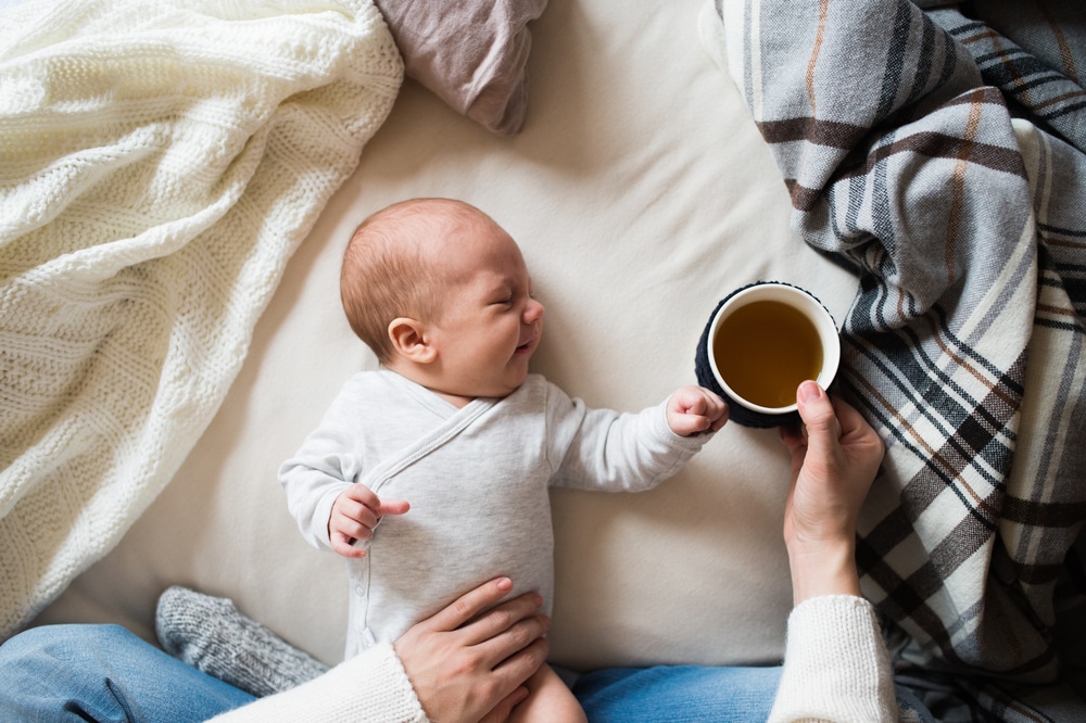 newborn with coffee