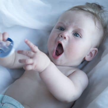 baby funny with pacifier