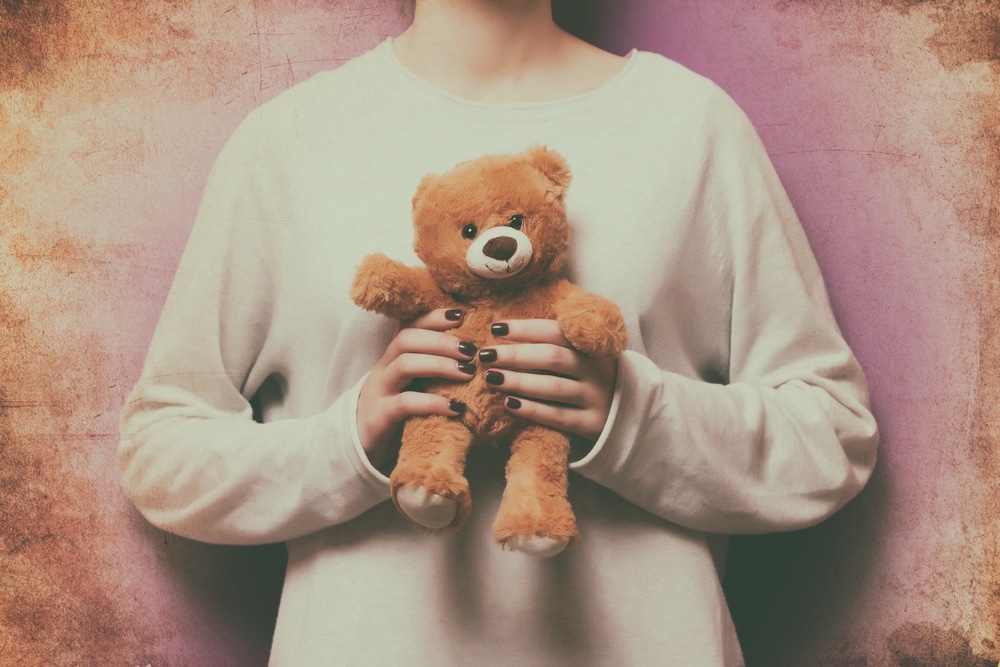 woman with teddy bear