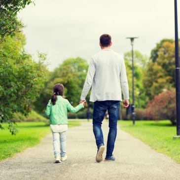 little girl walk away with father