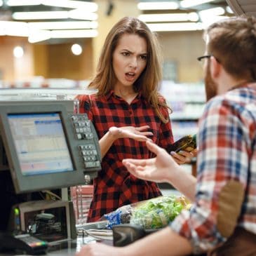 angry woman at cashier