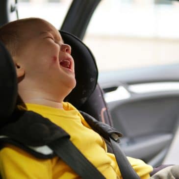 kid crying in car seat