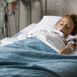 girl in hospital bed