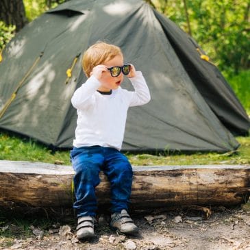 little boy camping