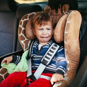little boy cry in carseat