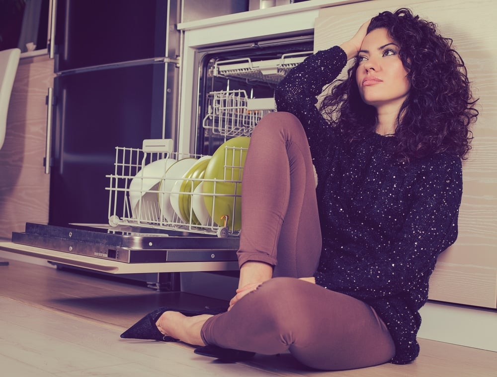 stressed woman sit on the floor