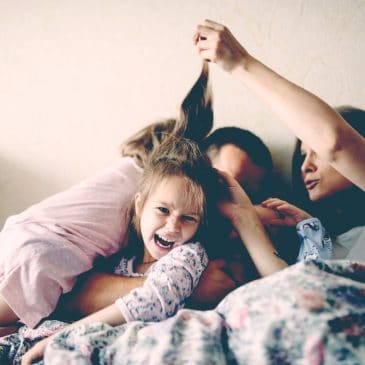 family in bed