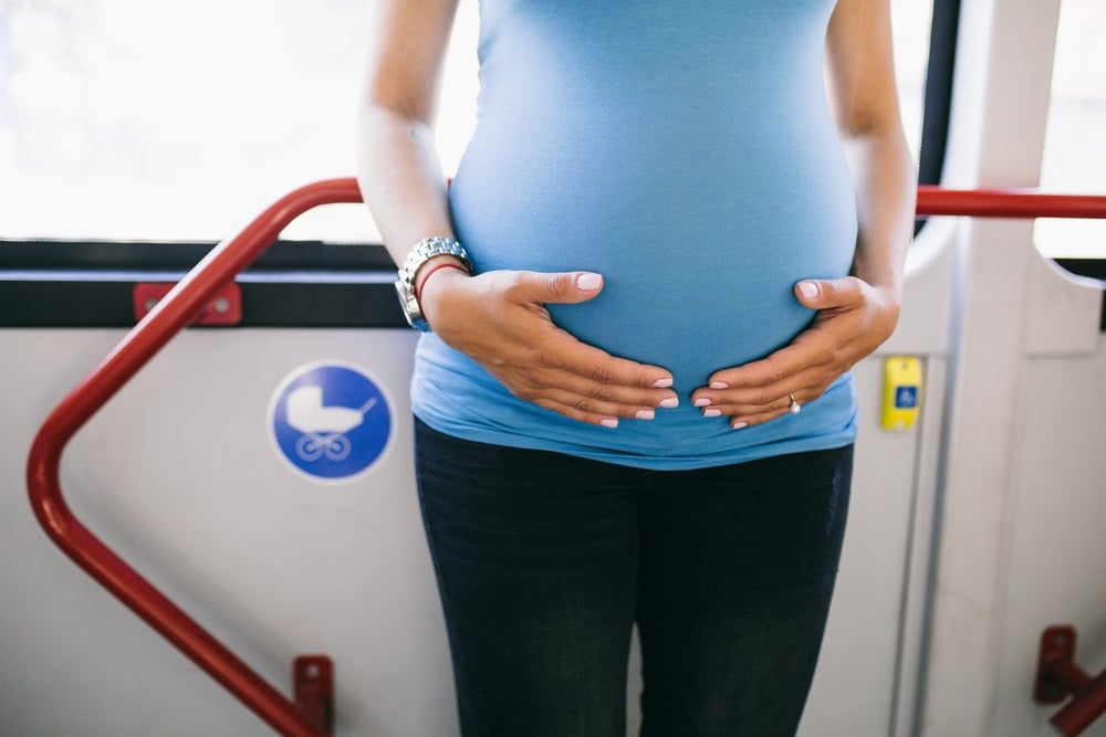 pregnant woman in a bus