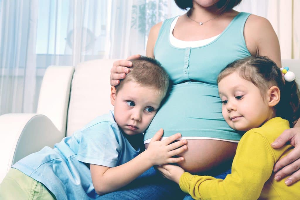 pregnant woman with 2 kids