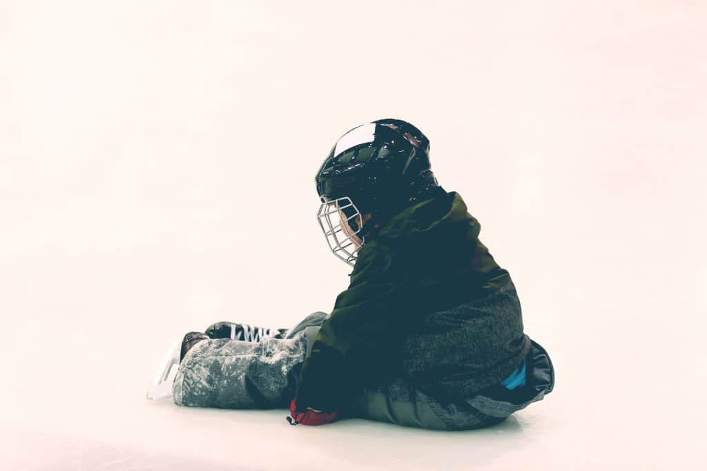 little kid falling down skate hockey