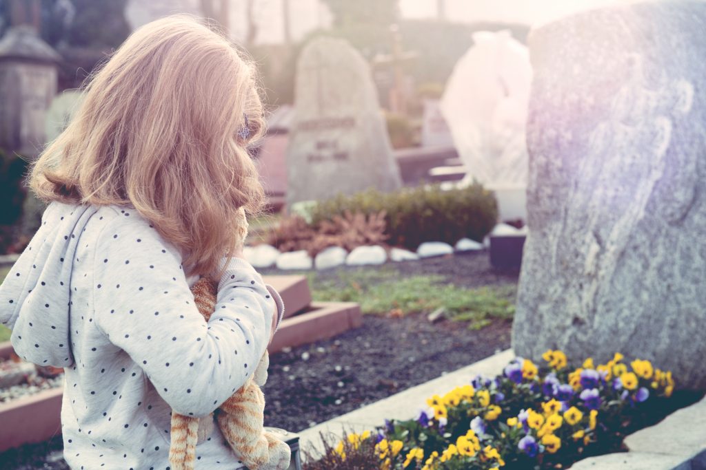 little girl in graveyard