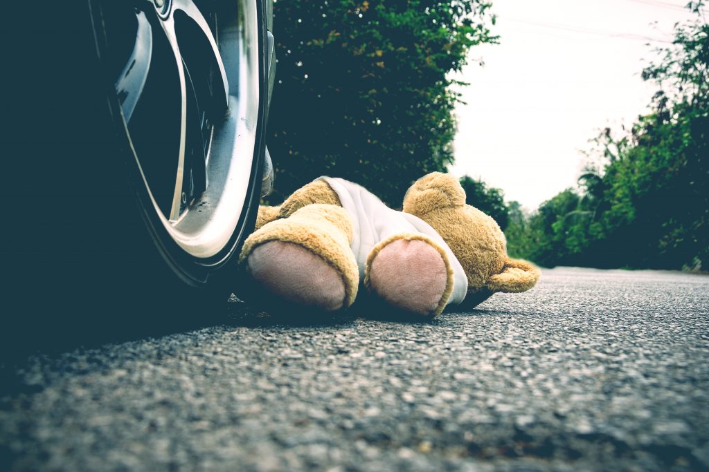 car and teddy bear