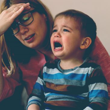 upset mother with kid crying