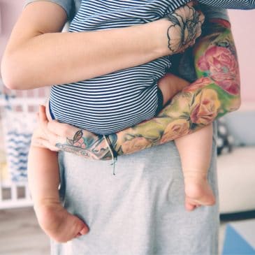 tattoo mother with baby