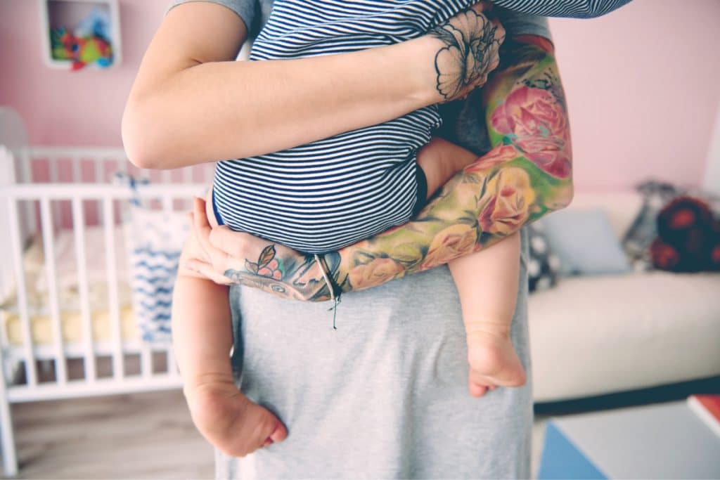 tattoo mother with baby