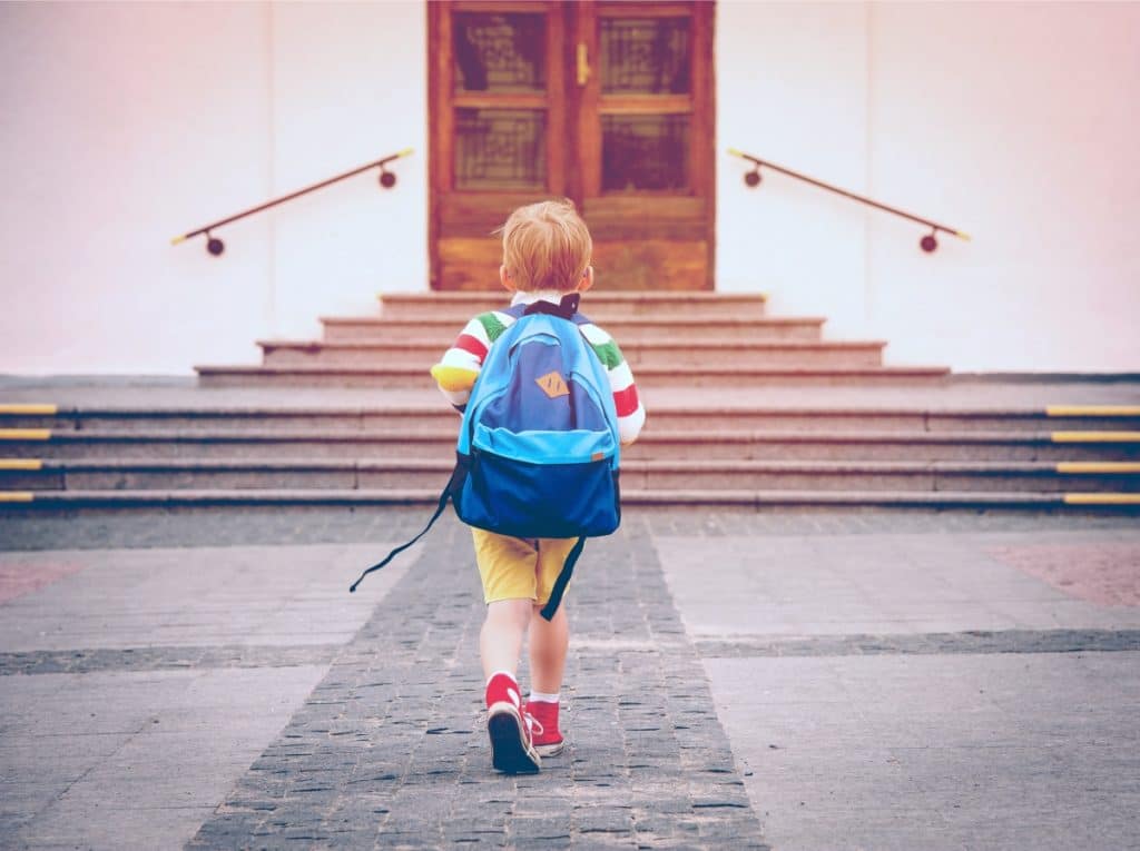 little kid going to school