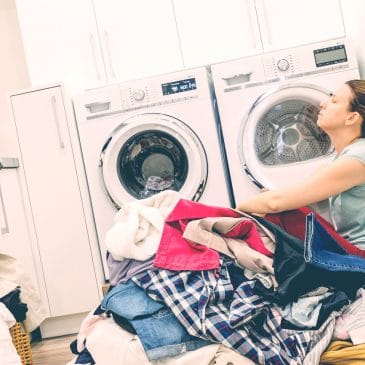 tired mother doing laundry