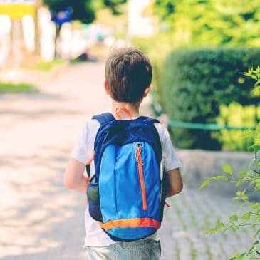 little boy going to school