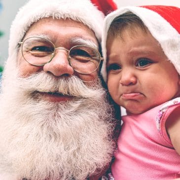 santa with crying baby