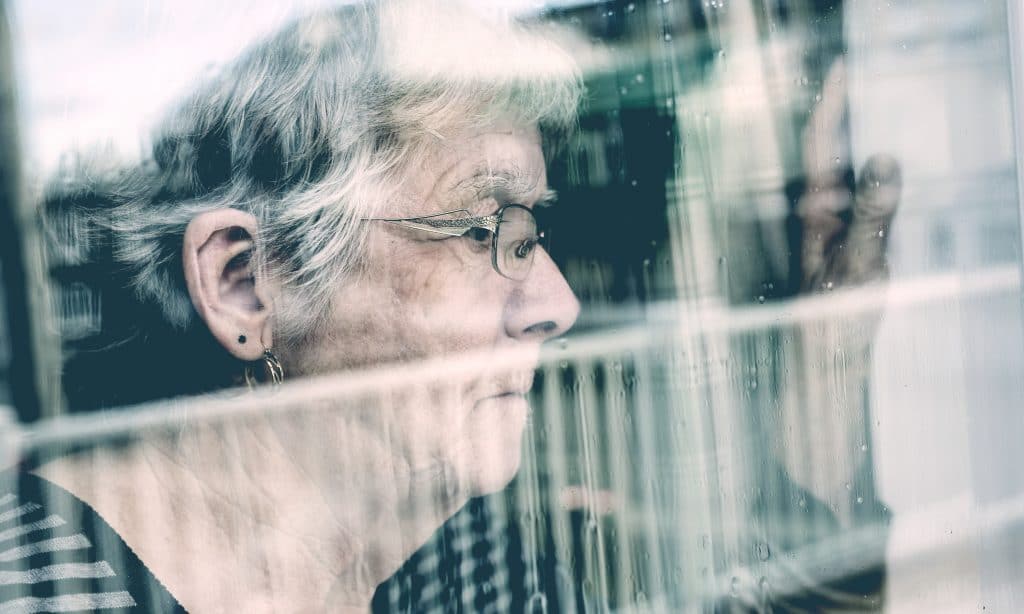 grandmother looking window