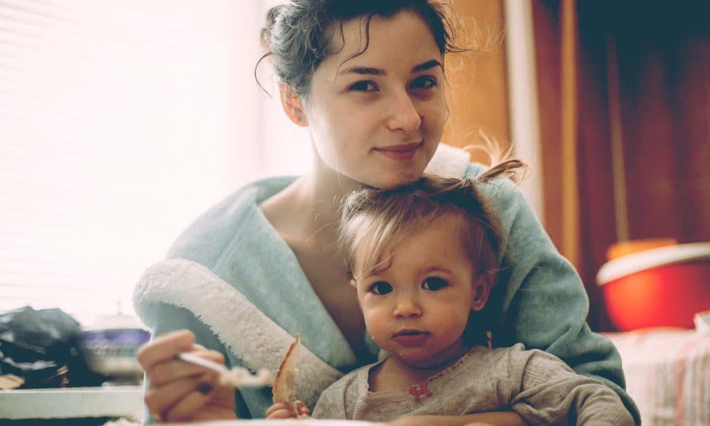 mother with kid in kitchen
