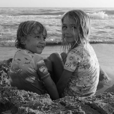 brother and sister on the beach