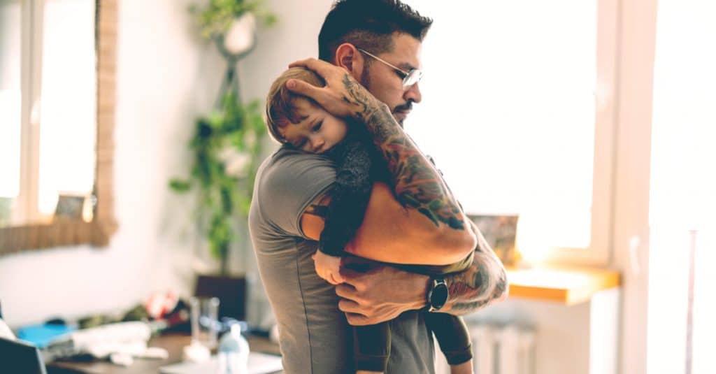 father hold little kid