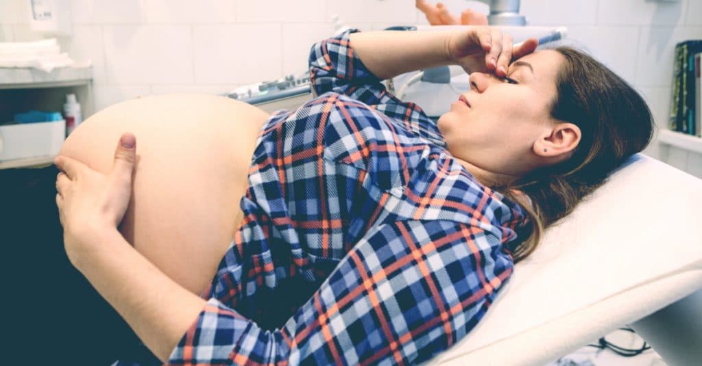 pregnant woman unhappy at hospital
