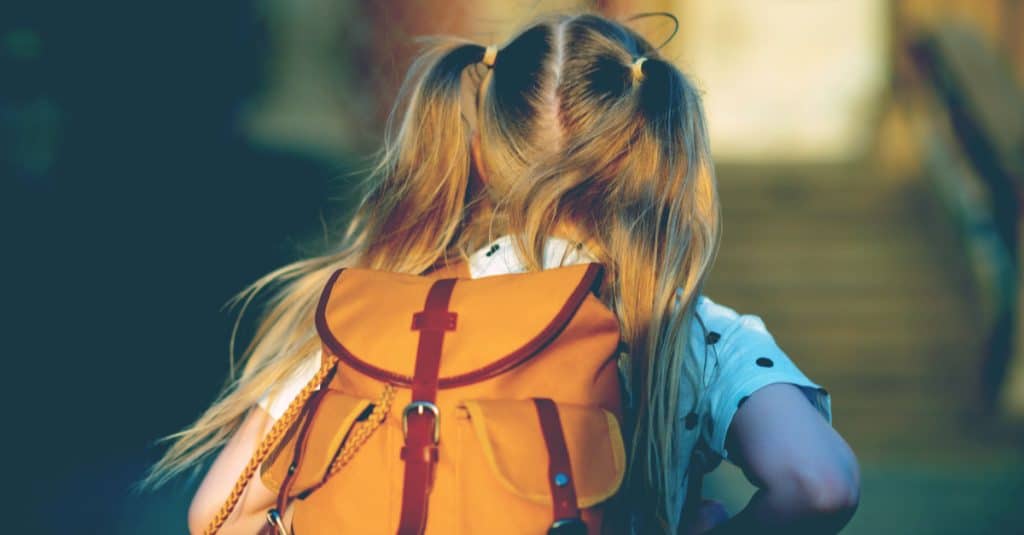 little girl going to school